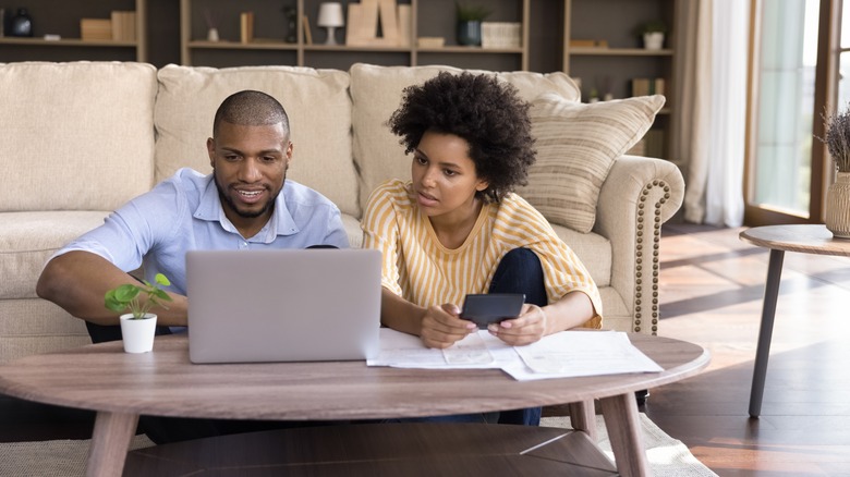 Young couple with laptop 