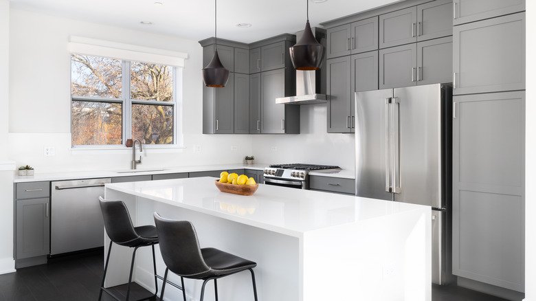 gray kitchen cabinets with island