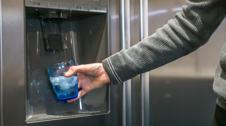 Fridge with water and ice dispenser