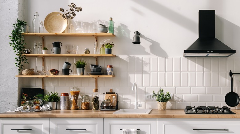 White modern kitchen with shelves