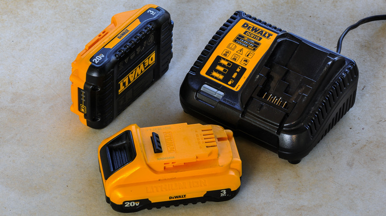A pair of DeWalt 20V batteries and a charger