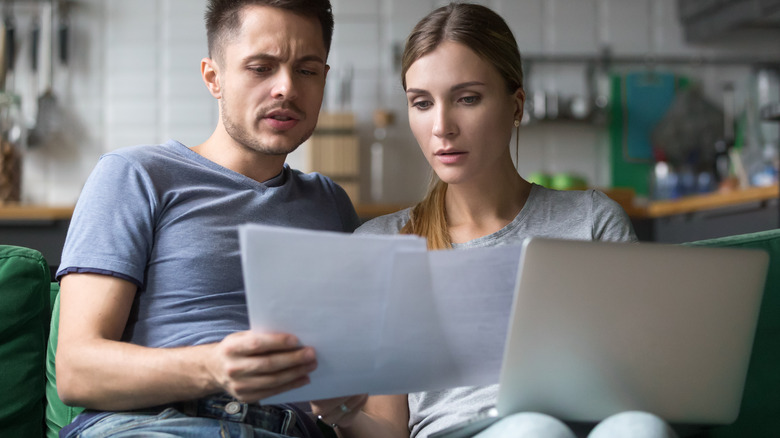 Couple looking at paperwork