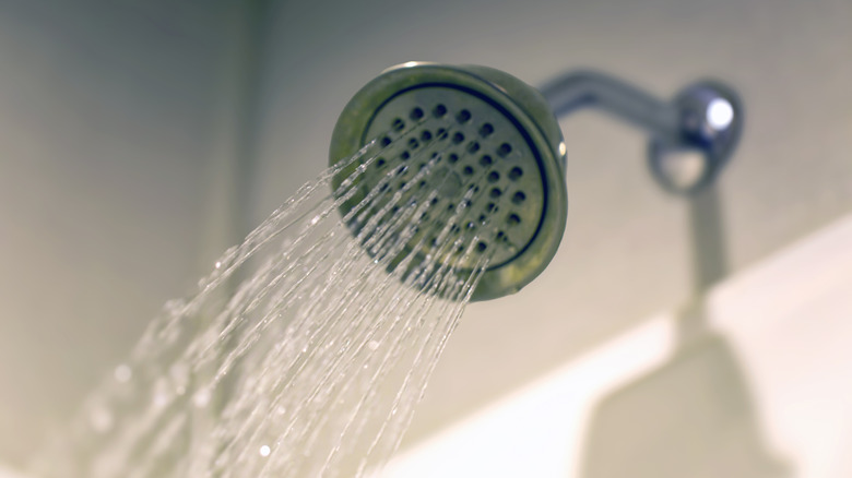 Water flowing out of a shower head