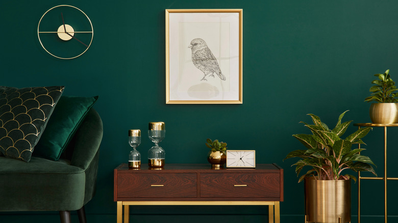 Living room with dark green walls