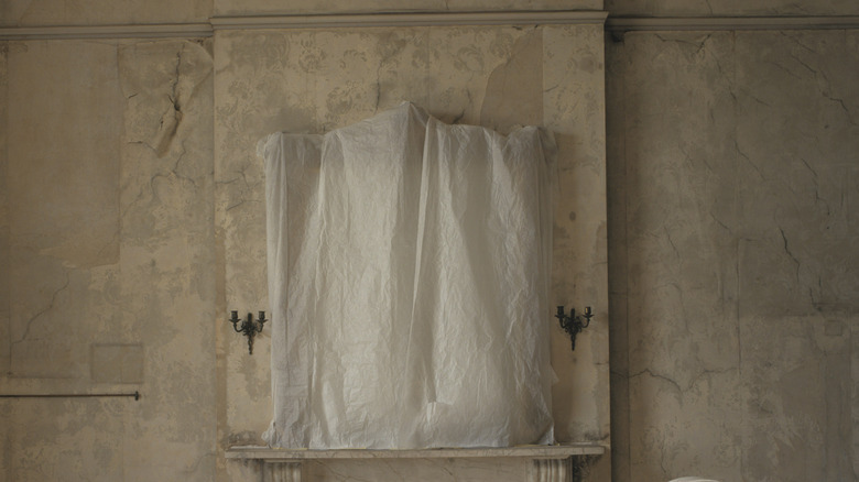 mirror covered with a cloth