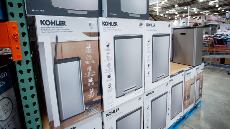 Kitchen garbage cans in a store on a shelf