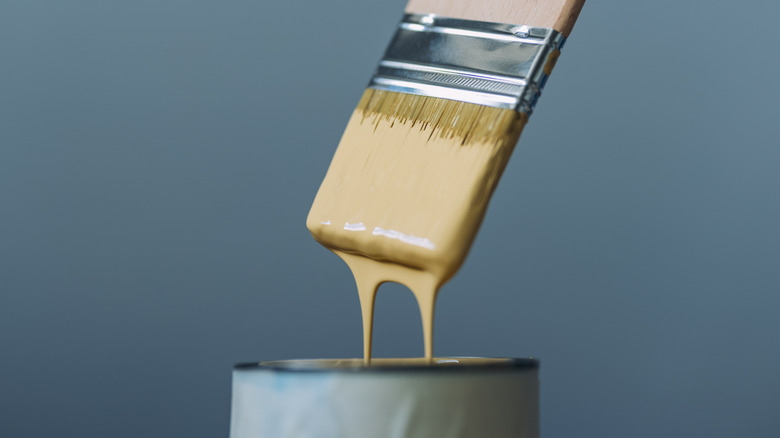 paintbrush dripping can