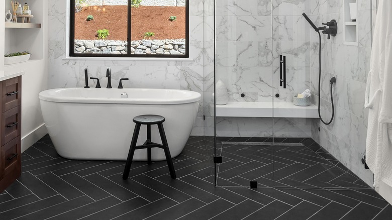 tiled bathroom with white grout