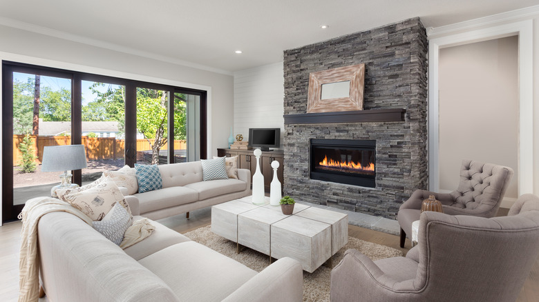 small television and fireplace in room