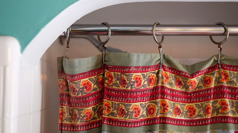 Patterned fabric shower curtain in traditional style