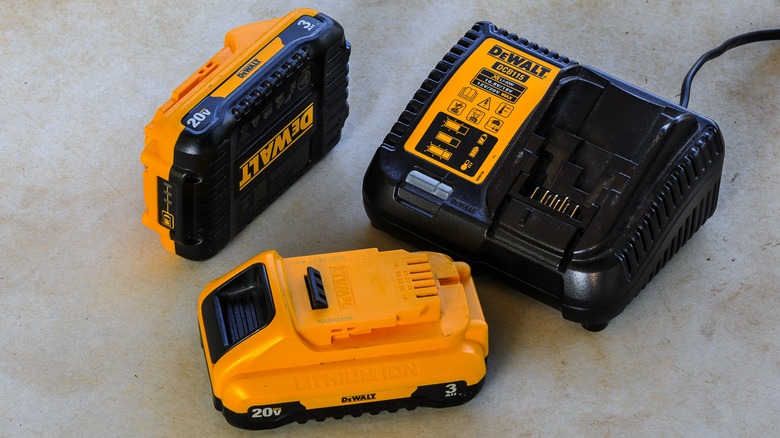 A pair of DeWalt 20V batteries and a charger