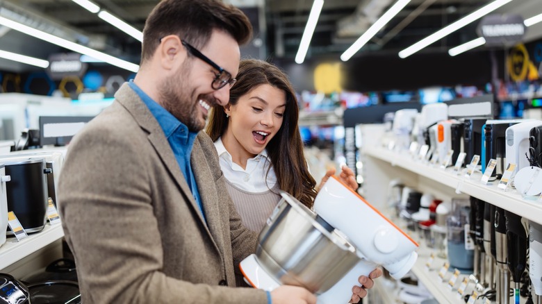 Couple shopping for small appliances