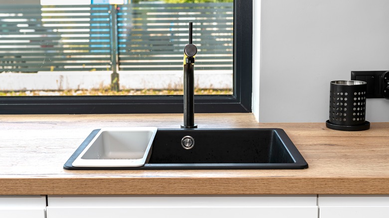 black sink with compartment