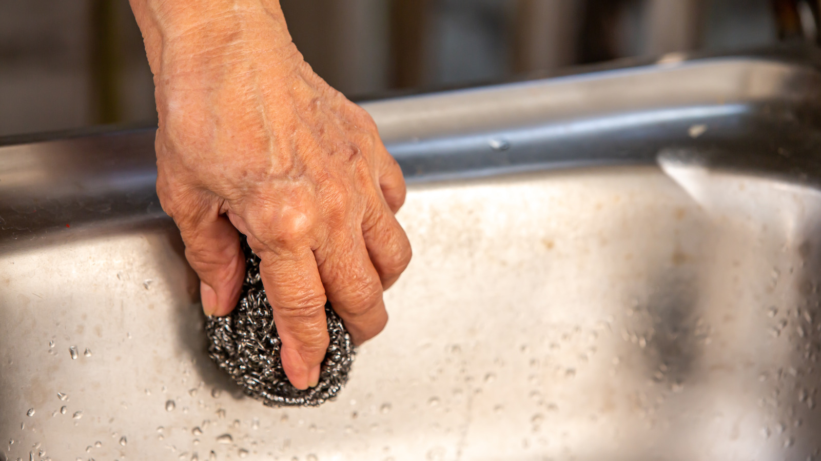 cleaning deep stains on stainless steel sink with 0000 steel wool