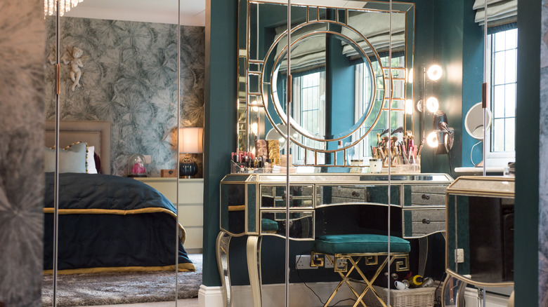Art Deco glass vanity with velvet chair