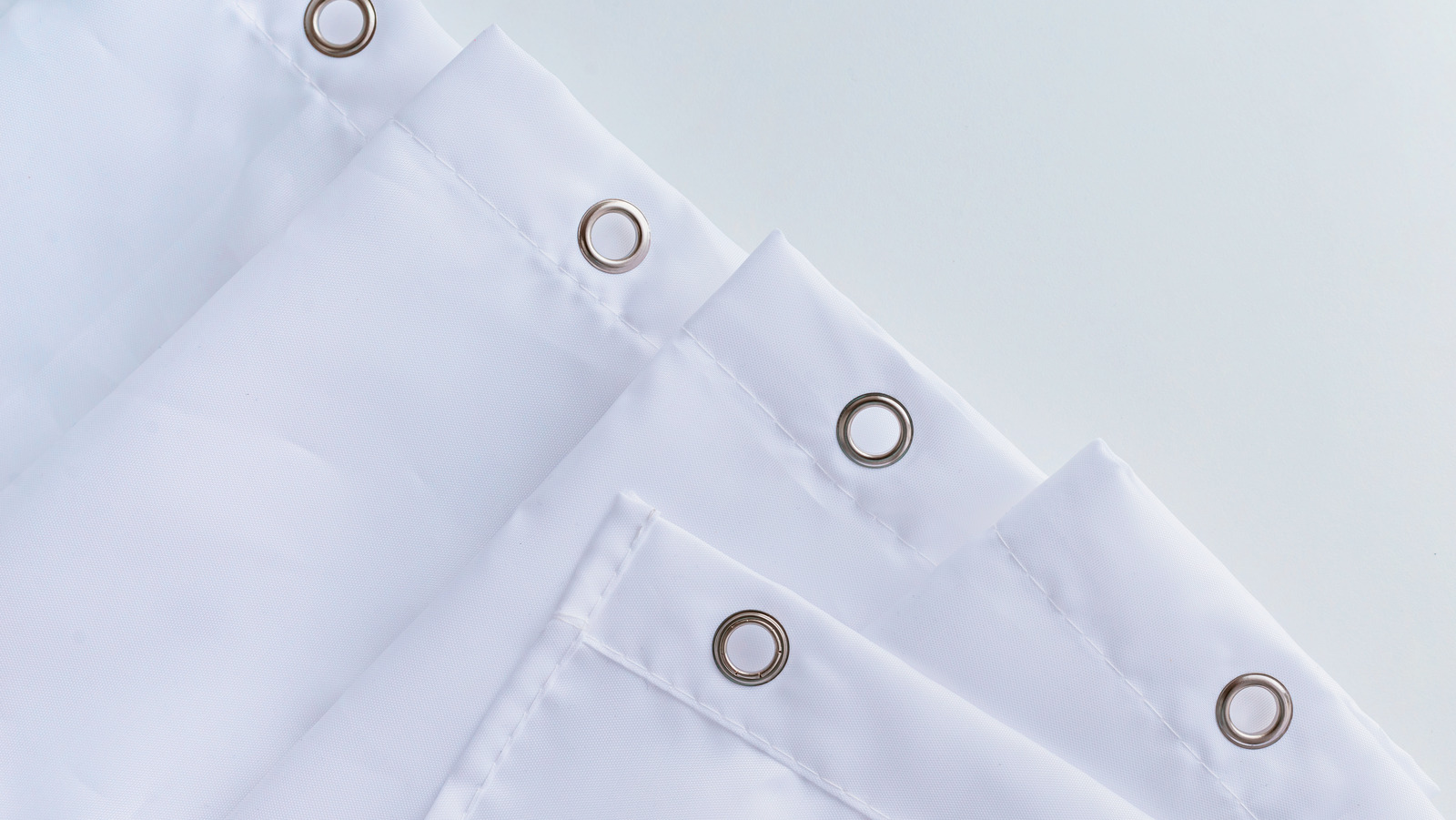 Why You Should Be Using Two Shower Curtains In Your Bathroom