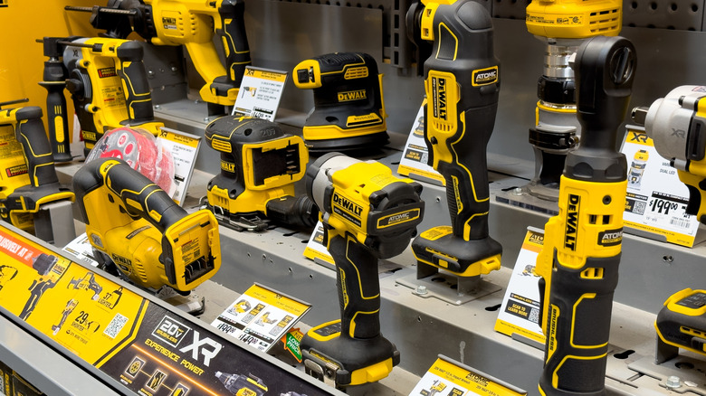 A range of DeWalt power tools in a store