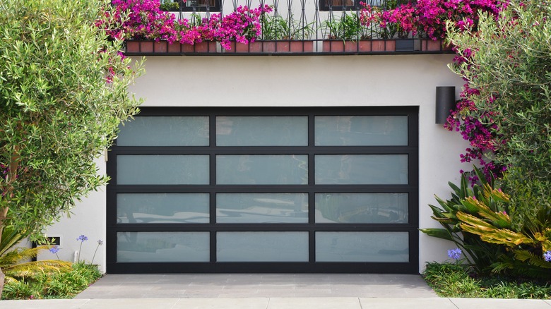 Glass garage door on home