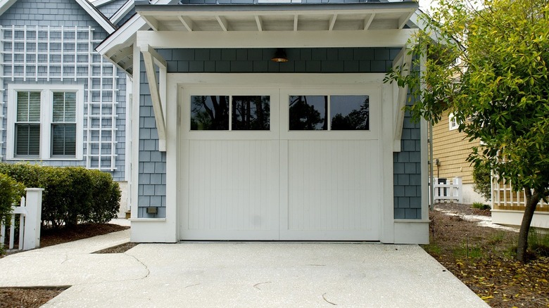 White garage door with cover