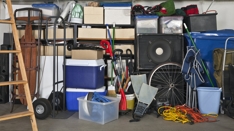 Cluttered garage with many boxes