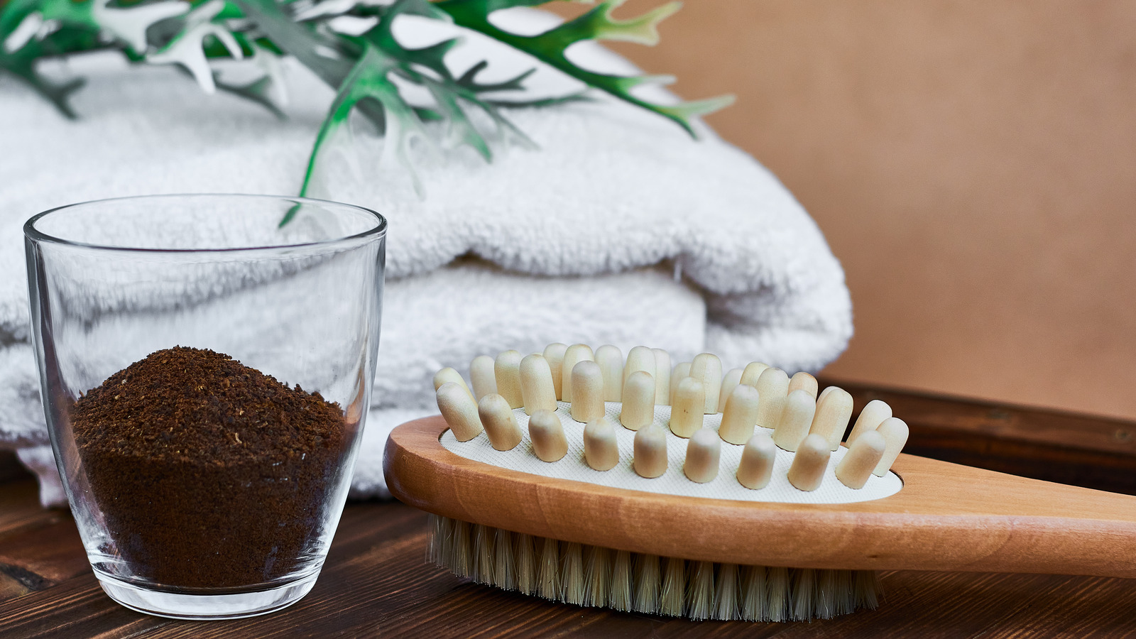 Why You Should Put A Few Scoops Of Coffee Grounds In Your Bathroom