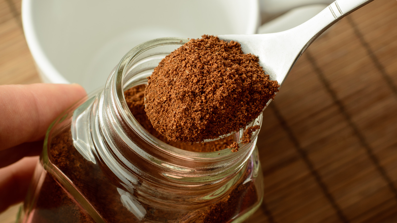 Why You Should Put A Jar Of Coffee Grounds In Your Freezer When Leaving