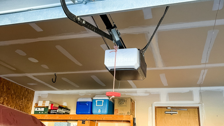 Garage door emergency release cord