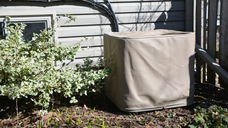 Air conditioner condenser with zip cover