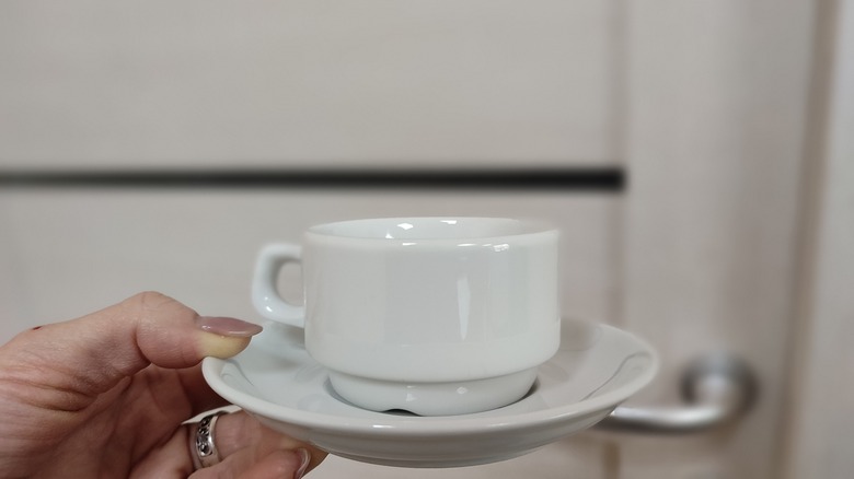 coffee cup near door handle