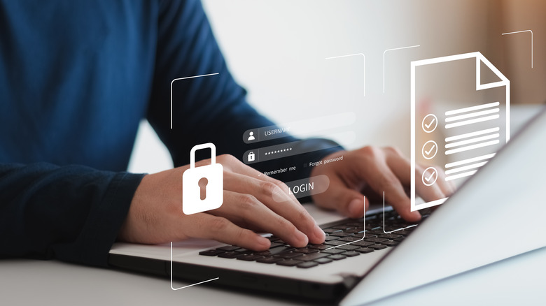 Man on laptop with cybersecurity icons