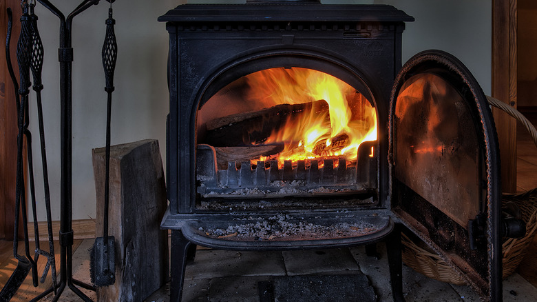 wood-burning stove with open door