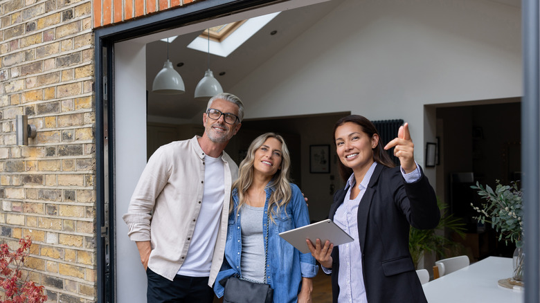 Realtor showing couple a home 
