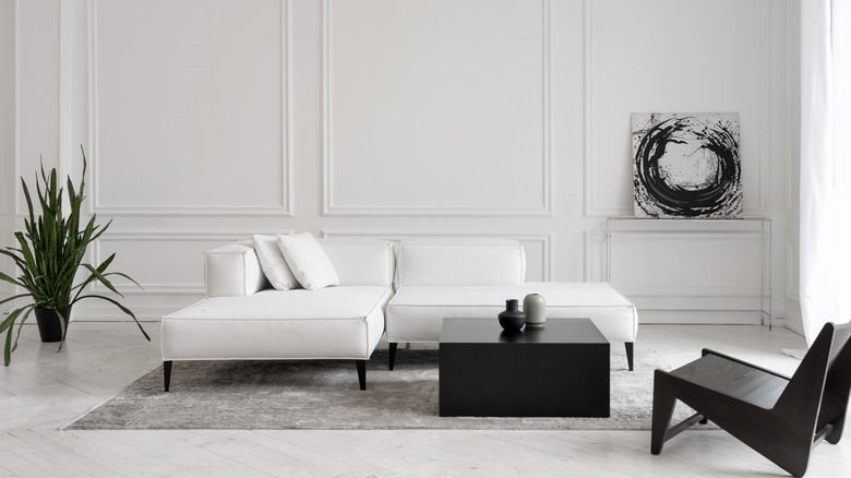 White couch and black furniture