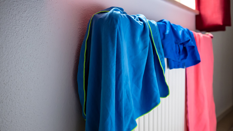 towels draped over radiator 