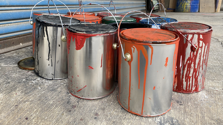 Cans of paint in garage