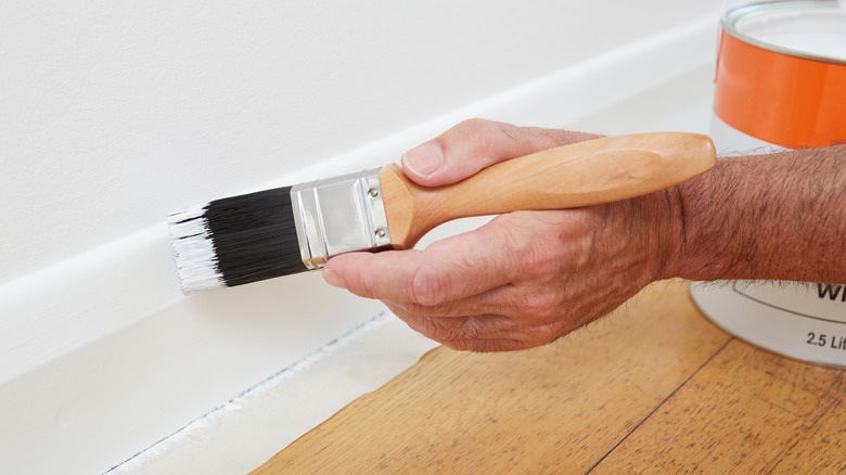 Hand painting baseboards