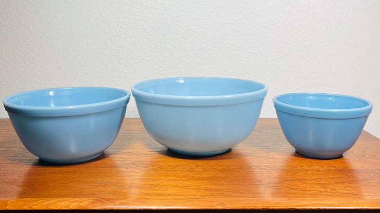 a set of three Pyrex Delphite Bluebelle mixing bowls
