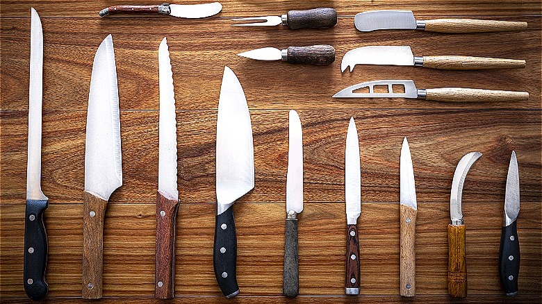 Knife set on wooden surface