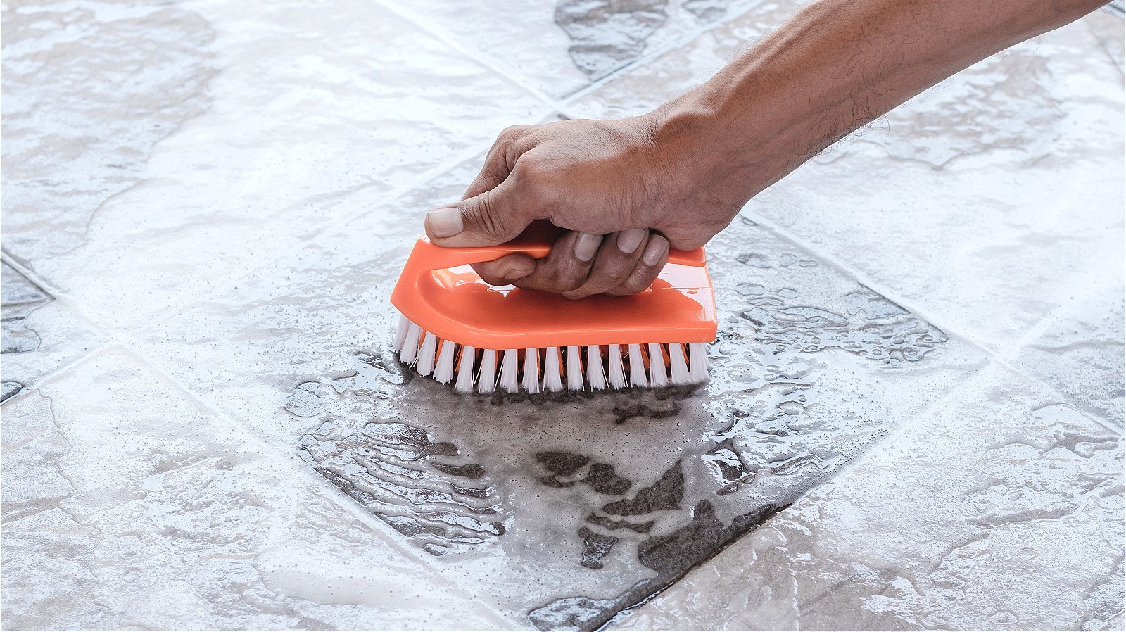 https://www.housedigest.com/img/gallery/why-youll-want-to-have-denture-tablets-on-hand-when-cleaning-tile-and-grout/l-intro-1693862523.jpg