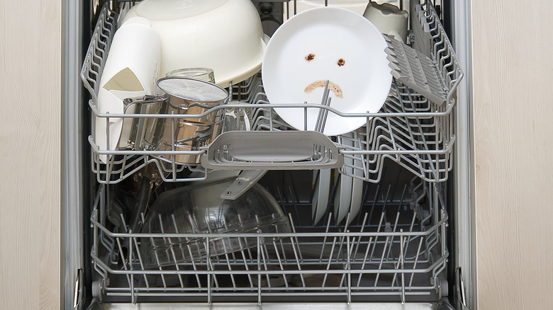 Dirty plate sitting in dishwasher