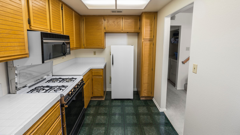 Kitchen with green flooring
