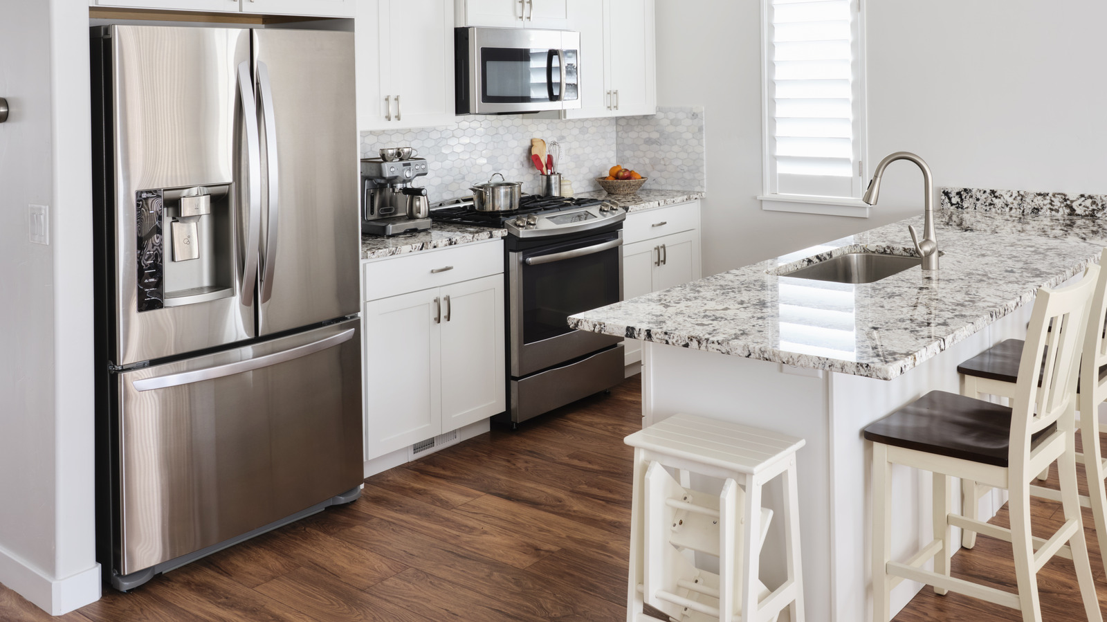 Why Your Fridge Is Making That Popping Noise, According To Our