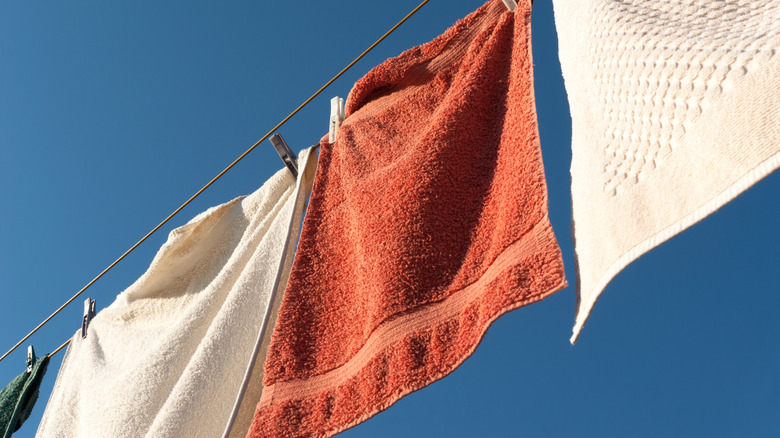 towels drying on clothes line