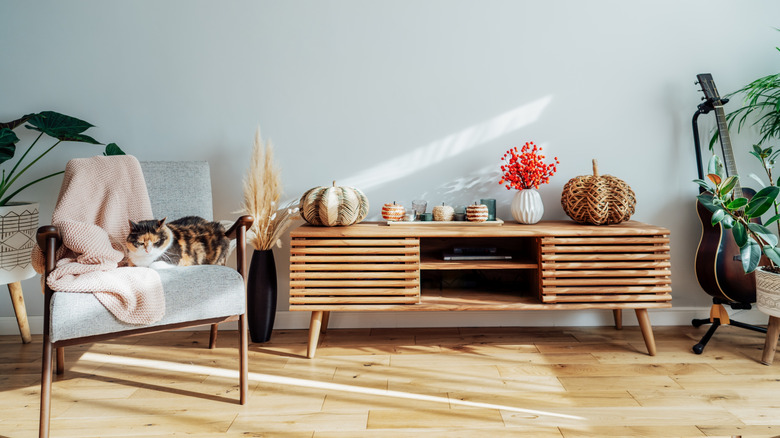 retro room with wood furniture and decor and colorful accents