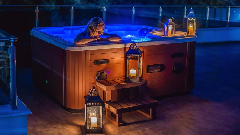 enjoying hot tub at night