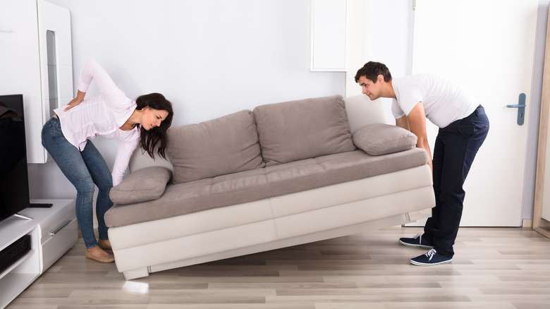 couple difficulty moving couch