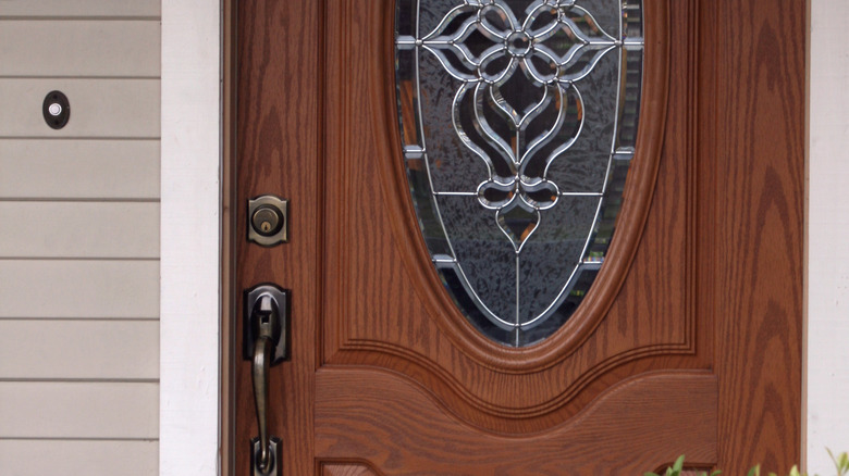 front door with classic doorbell