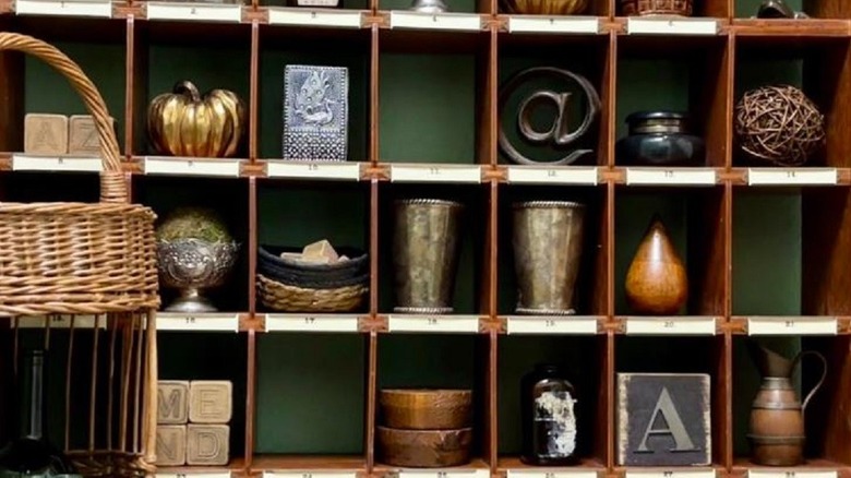 Mail sorter upcycled into home decor with small items