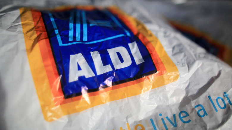 A close-up of a thicker Aldi bag with the logo front and center