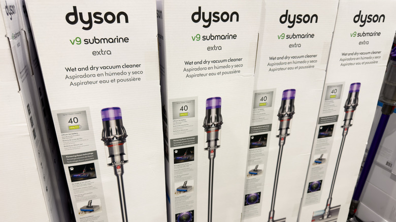 Boxes of Dyson v9 submarine extra wet and dry vacuum cleaners